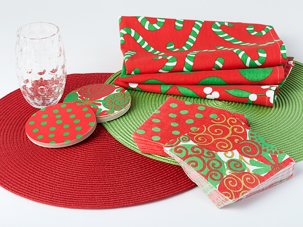 Exclusive holiday party collection:  Woven placemats, colorful paper napkins, sturdy double-sided paper coasters, and vibrant cotton kitchen towel set.